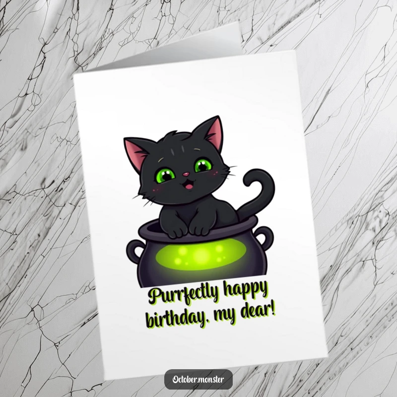 Funny Free Printable Birthday Card: A smiling black cat with glowing green eyes sits on a cauldron, wishing happy birthday.